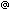 (at)